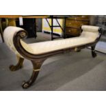 A bedroom bench with cream silk upholstery, scroll arms and feet, carved floral and gilt