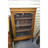 An Edwardian mahogany glazed vitrine with satinwood banding