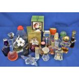 An assortment of various perfume bottles including Cartier, Marc Jacobs, Estee Lauder and Chloe (