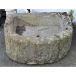 A weathered granite D trough 29 3/4 x 24in