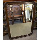 Victorian Queen Anne style walnut mirror.
