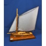 A mid century wooden sailing boat table lamp.