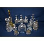 A quantity of various glassware to include a Waterford decanter, Art Deco decanter and a pinched