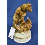 A Hungarian Zsolnay porcelain group of two playful bears by Markup Bela, circa 1911, 12in. (30.5cm.)