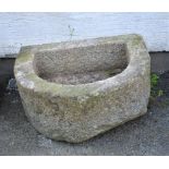 A weathered granite D trough 28 x 23 1/2in