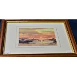 A watercolour by Paul Killick depicting Cobo Bay at sunset.