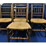 Four circa 1800 beech and elm spindle back chairs.