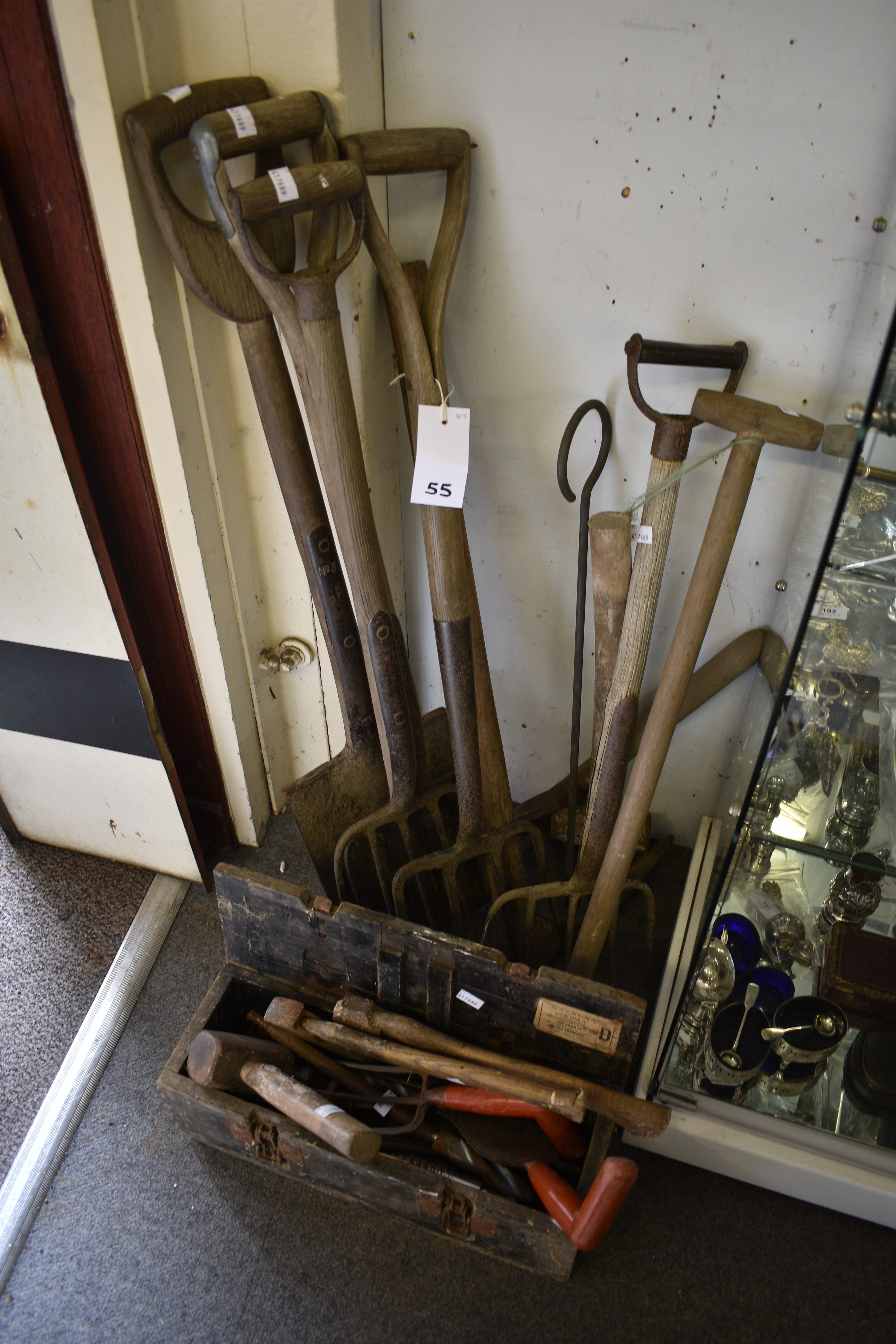 A collection of vintage tools some housed in a WW2 German ammunition box for a 10cm