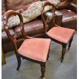 A pair of balloon back chairs with dark pink upholstery (2)