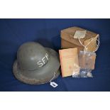 A WWII British Zuckerman helmet with SFP (Street Fire Party) letter, a British steel helmet, 2