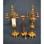 A 19th century French bronze lizard candlestick the urn shaped nozzle with fruiting vine decoration,