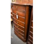 A French cherrywood tall bowfront chest of seven drawers (OPTION)