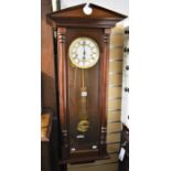 A mahogany Vienna style wall clock by Guernsey Clockmakers