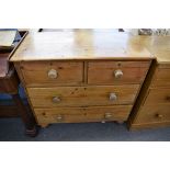 A pine four drawer small chest of drawers with bun feet, 90 x 35cm, 84cm high.