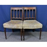 A pair of Regency carved mahogany side chairs with triple splat backs