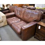 A brown leather two seater sofa with matching club chair (2) OPTION