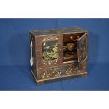Early 20th century Oriental lacquered table top cabinet.