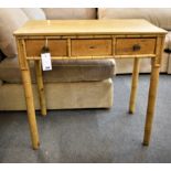 Pine side table with three drawers, on bamboo effect turned supports, 80 x 47 cm, height 76 cm. a/f