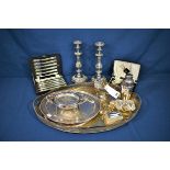 A large oval silver plated drinks tray together with a large pair of silver plated foliate