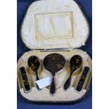 A George V silver and tortoiseshell dressing set in fitted case Horton & Allday, Birmingham 1921,