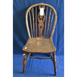 A 19th century wheelback Windsor chair.