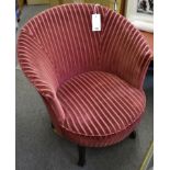 A striped velvet upholstered tub chair.