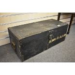 A vintage black painted pine storage box with carrying handles, 30in. (76.2cm.).
