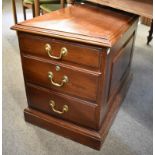 A small mahogany two drawer filing cabinet.
