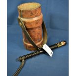 A leather shell carrying case, together with an EII carved wooden truncheon with royal cipher decal.