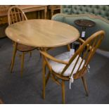 A vintage Ercol blonde breakfast table with magazine rack plus two Ercol Quaker dining chairs (3)
