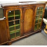 A 1930's walnut glazed bookcase (134.5 x 114.5cm)