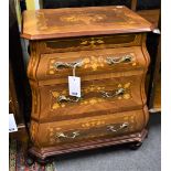 A reproduction veneer bombe chest with floral decoration and decorative brass handles (52cm x 66cm)