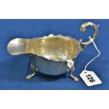 A George VI silver sauce boat Blanckensee & Son Ltd, Birmingham, 1937, of typical form, scroll