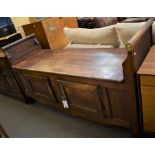 An unusual early 19th century French Empire Normandy oak and stained pine settle