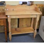A two tier stripped pine washstand measuring 36 x 80cm, height 88cm.
