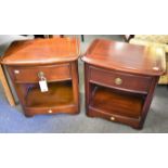 A pair of French cherrywood bedside tables. (2)