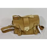 A Jimmy Choo suede handbag with shoulder strap and chunky brass hardware a/f.