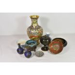 A collection of vintage Chinese cloisonne vasesand bowls of varying forms, sizes and dates, the