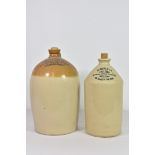 A Guernsey "Bertin Feuillerat" Caves de Bordeaux 2 gallon stoneware flagon together with a Le