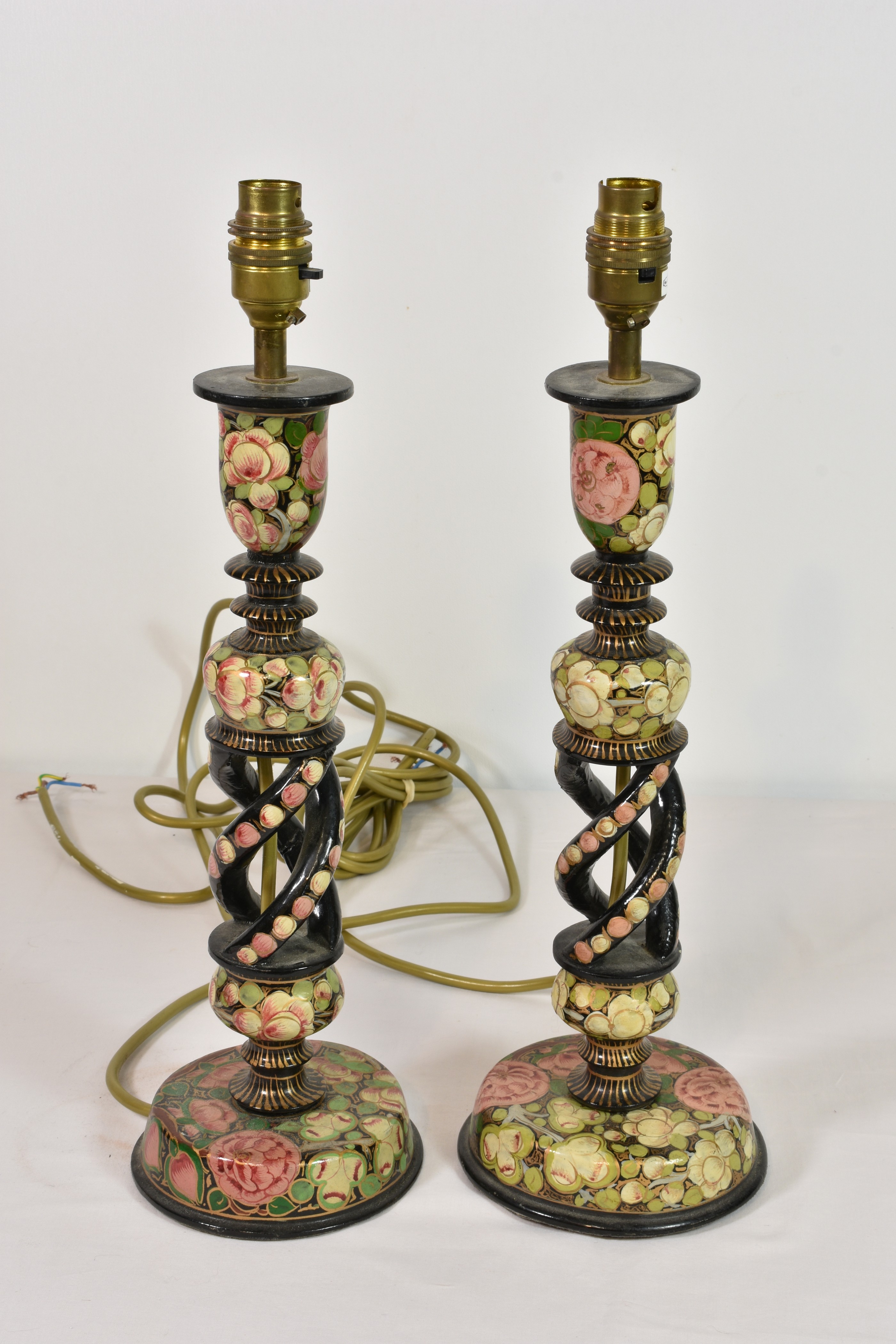 A pair of Kashmiri open twist candlestick lamps