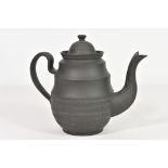 A late 18th century black basalt coffee pot, probably Wedgwood with machine turned decoration,