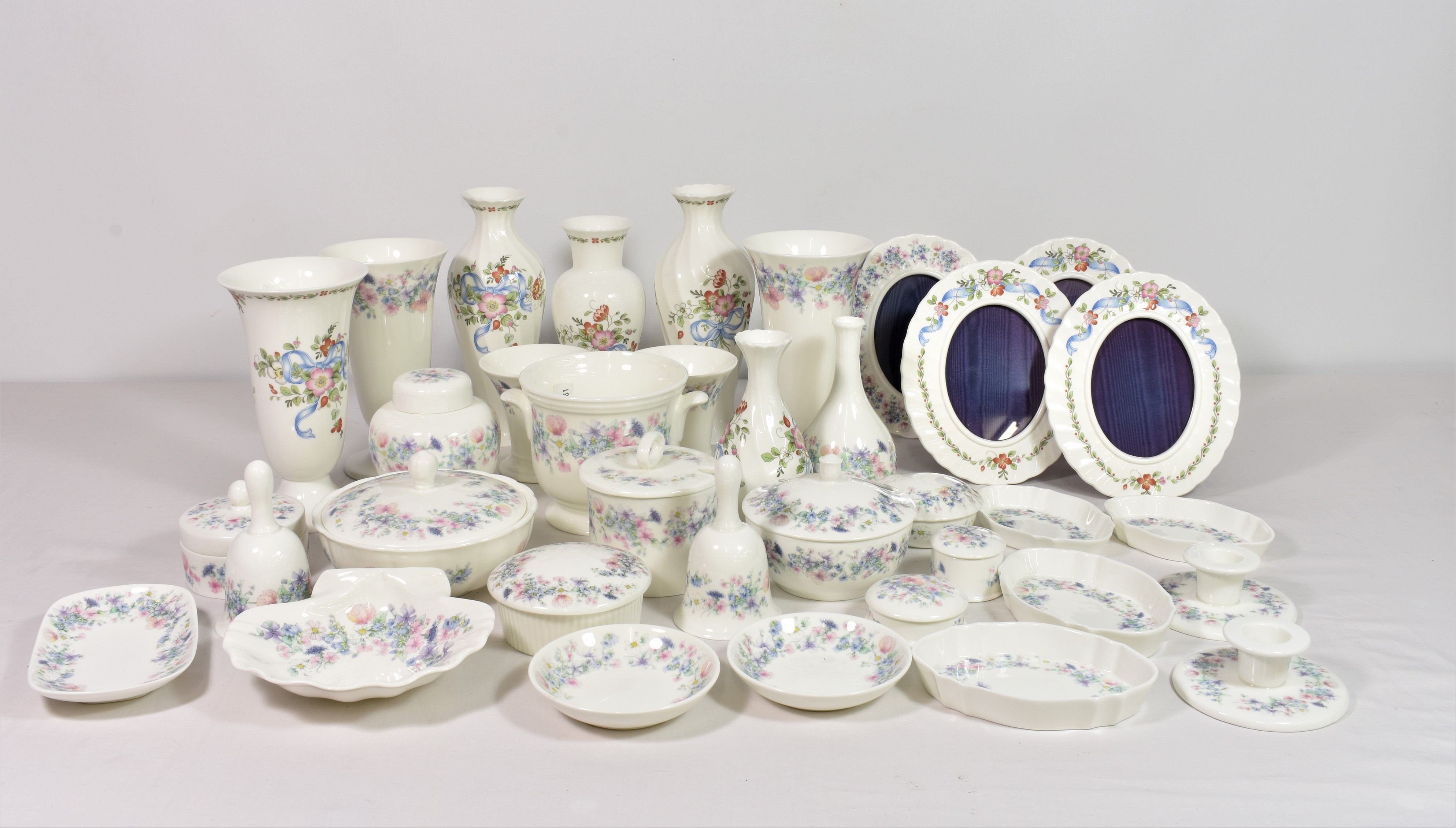Wedgwood - 'Angela' pattern china comprising of photo frame; vases; bells; trinket boxes; pin