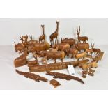 A large collection of carved hardwood African animals. Elephant, rhino, warthog etc