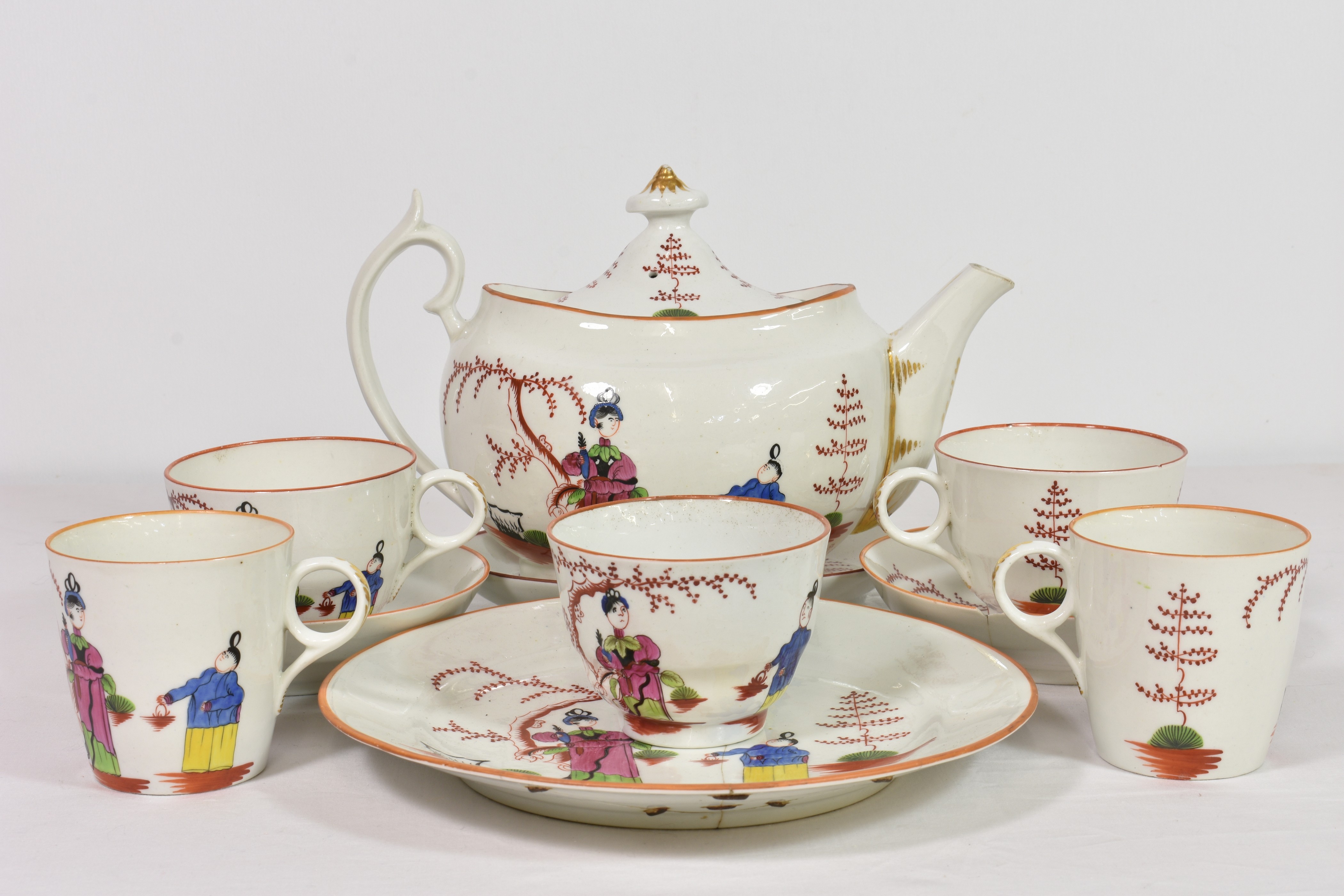 A New Hall soft paste porcelain part tea and coffee servicec.1800, boldly painted with a Long