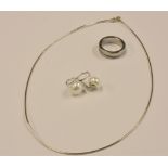 A Calvin Klein silver and CZ ring ring size O 1/2; together with a silver snake chain; and a pair of