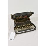 An early 1920s Smith Corona folding typewriter