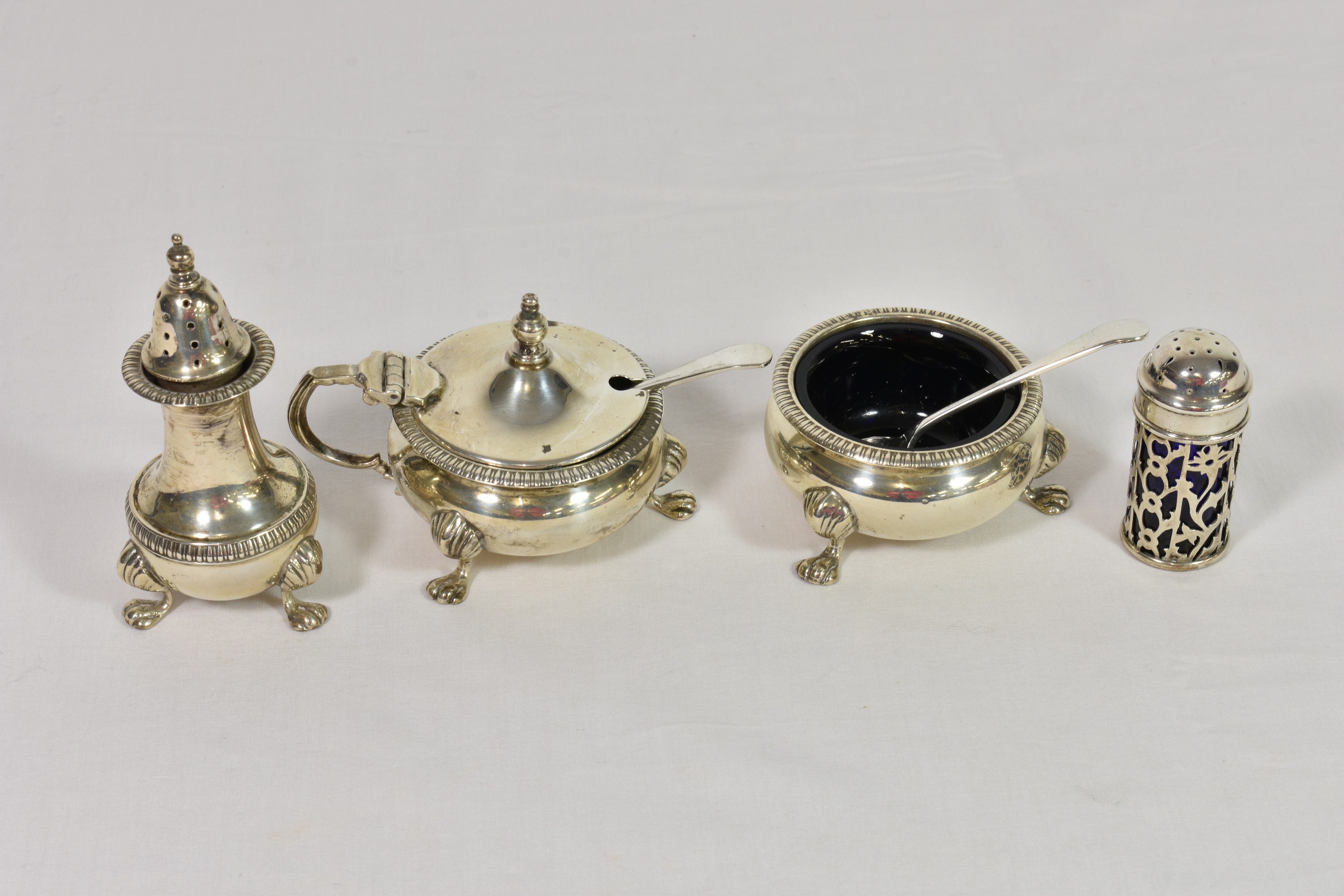 A George VI three piece silver cruet/condiment set Ernest W Haywood, Birmingham, 1948 & 1951,
