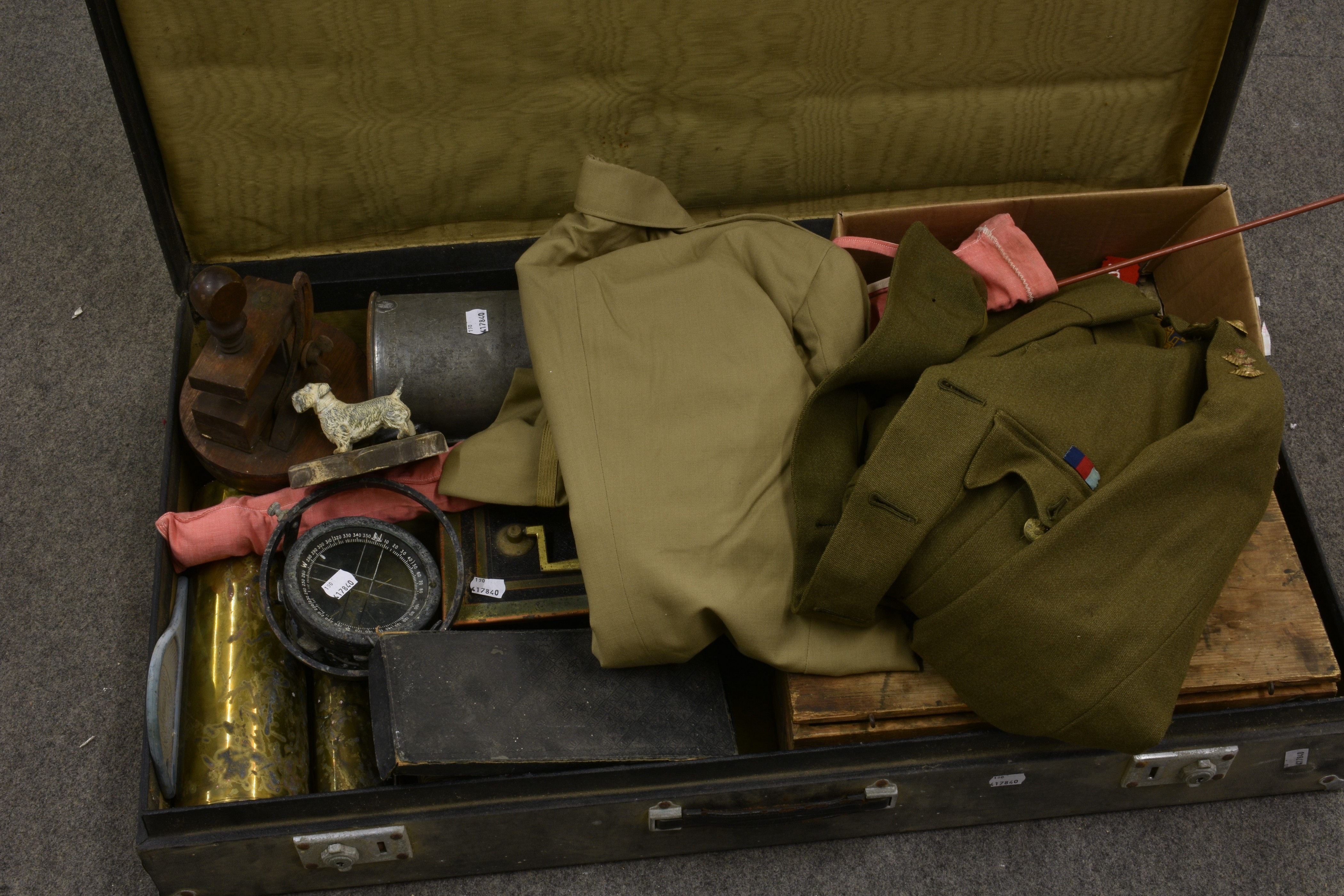 A rummage box of various military collectables to include two military jackets, an RAF dogtag, RAF