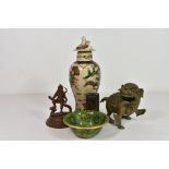 A small group of Oriental collectables comprising a Chinese famille rose crackle glaze vase and