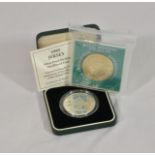 Two commemorative coins, a 1995 Jersey Silver Proof Piedfort two pound coin and a Royal Wedding